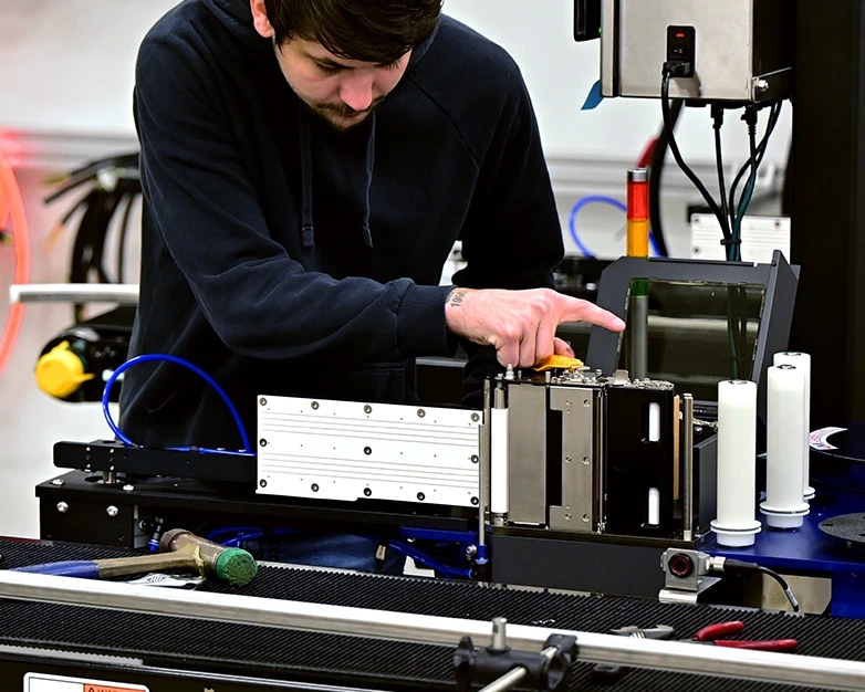 CCS technician providing on-site labeling system support